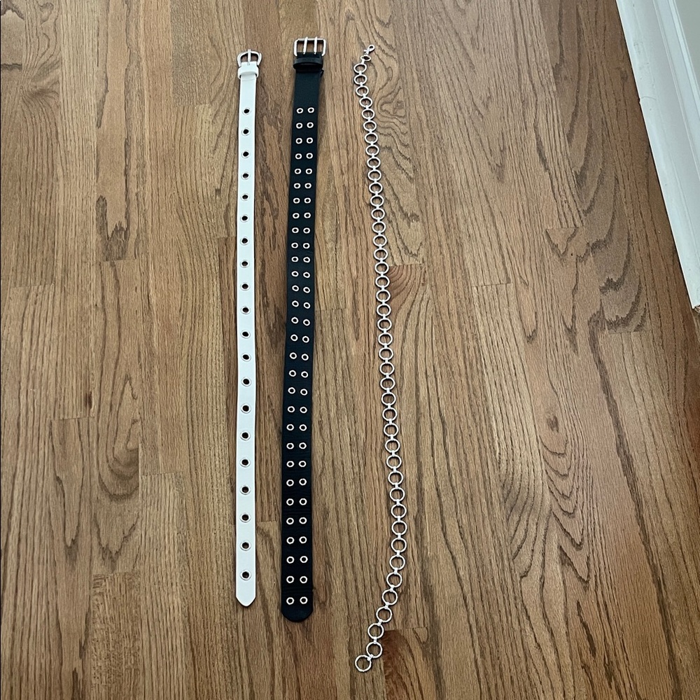 Black and White Grommet Belts with Silver Chain Belt